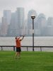 Kite trainer: me on Hoboken lawn, Wall Street in background
